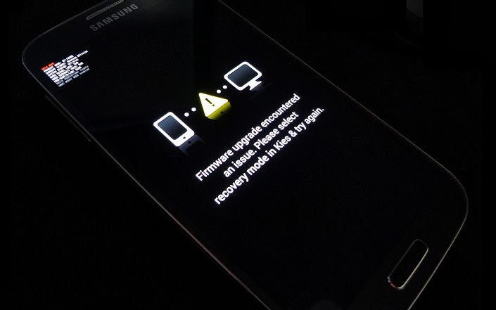 Andorid phone showing the message "Firmware upgrade encountered an issue. Please select recovery mode in Kies & try again." 